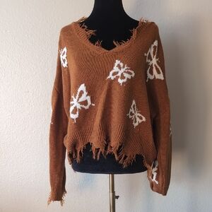 Frayed V-Neck Sweater with Butterfly Design